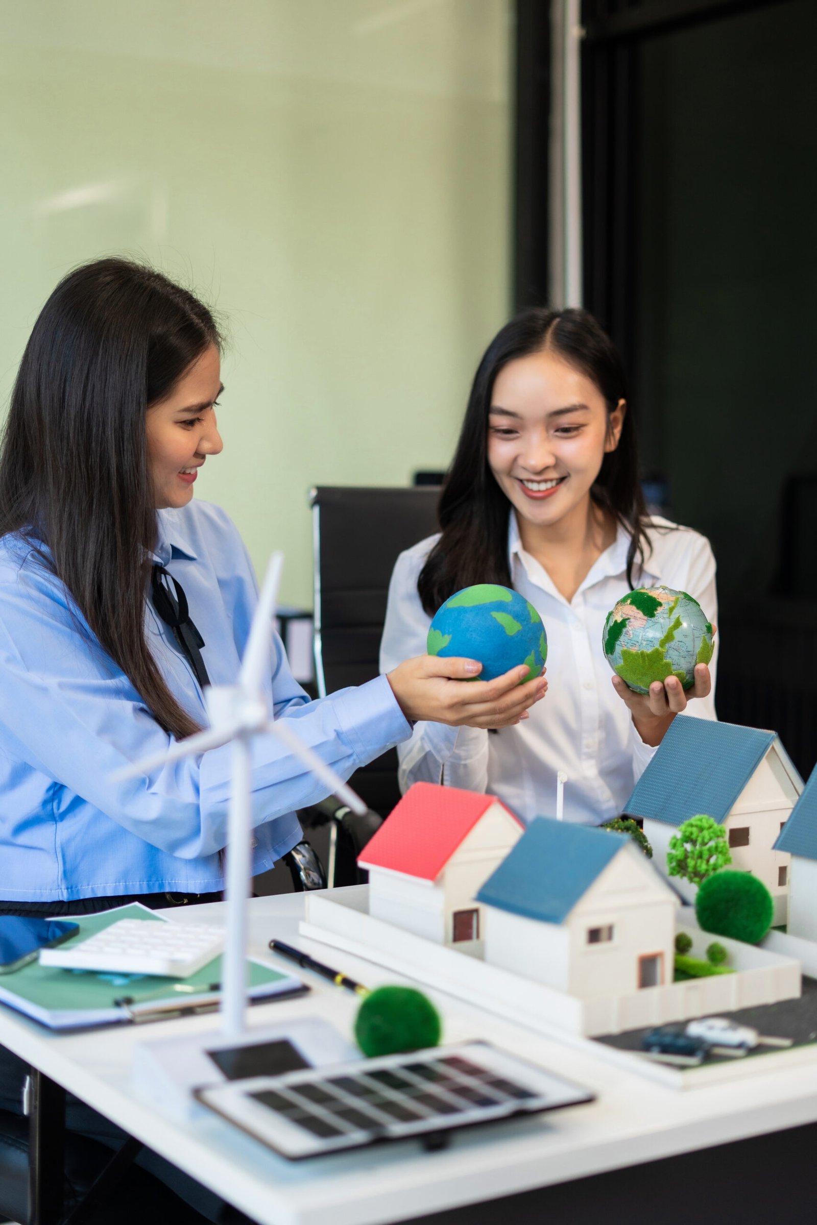 Businessman team brainstorming using computer on CO2 emission reduction concept. along with climate, energy, sustainability, environment.